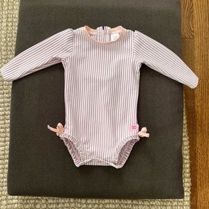 RuffleButts One Piece Rash Guard Purple Seersucker